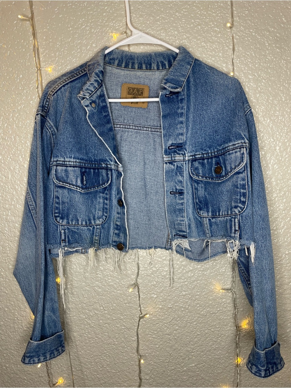 GAP Distressed Cropped Denim Jacket in Light Blue